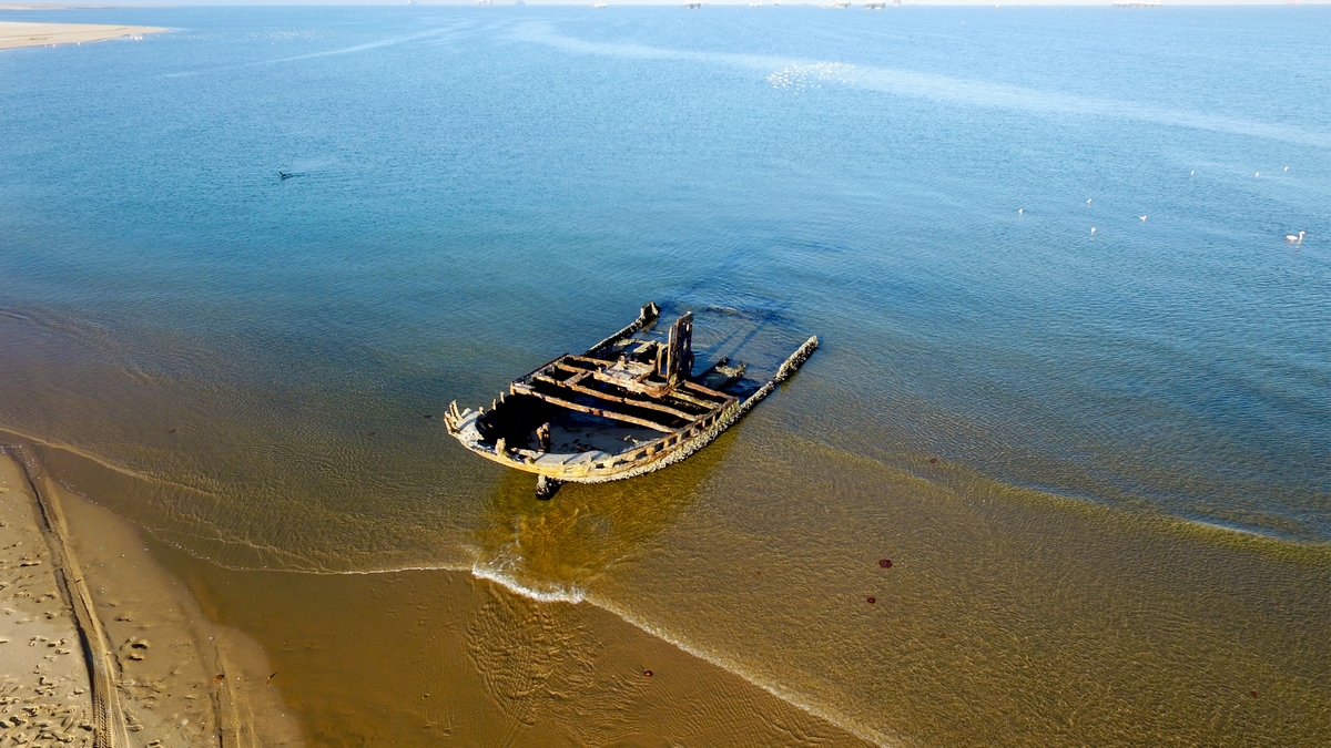Unknown shipwreck - aerial drone photo, near Pelican Point Lodge, Walvis Bay, Namibia